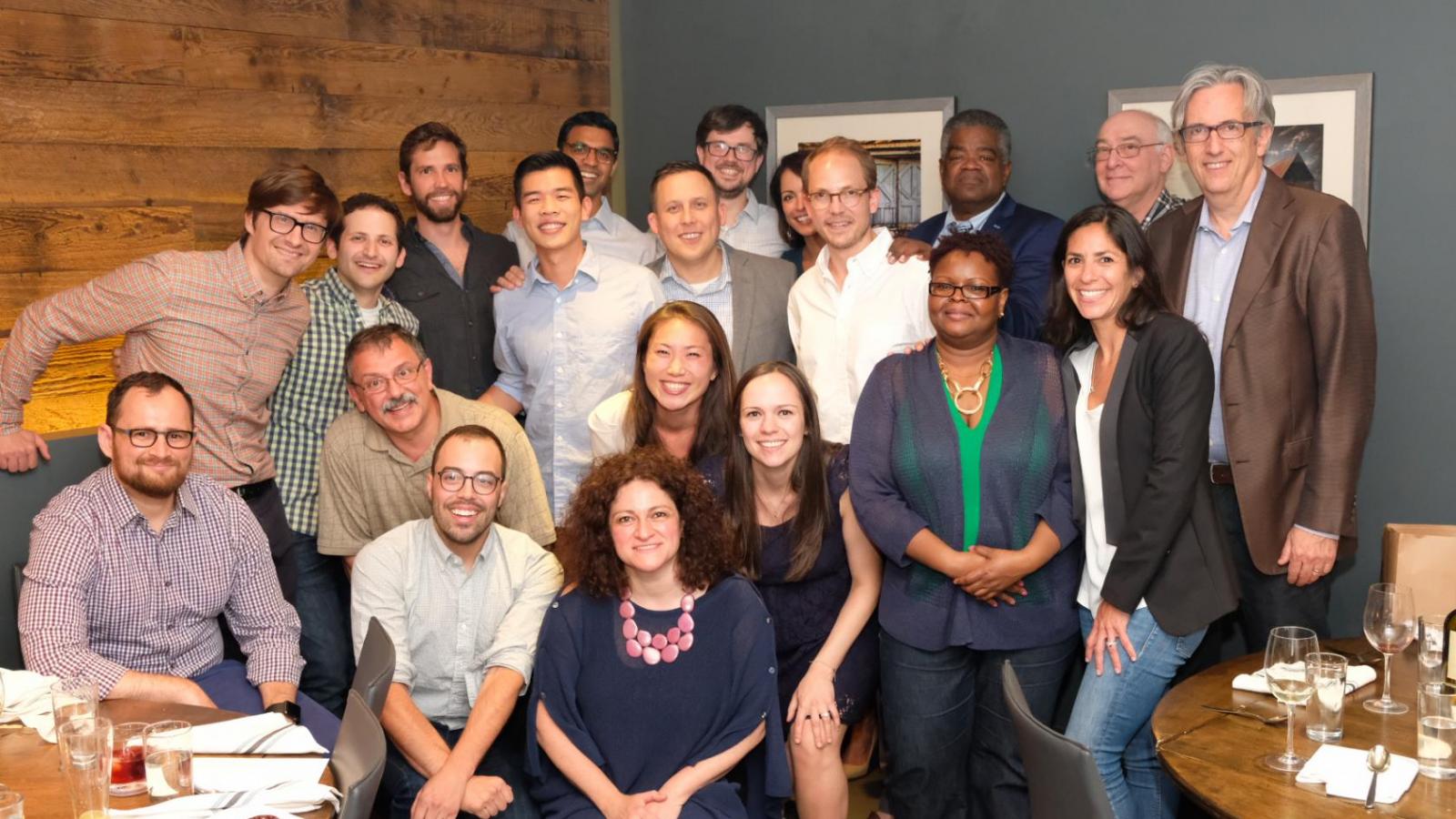 Group of people pose for photo
