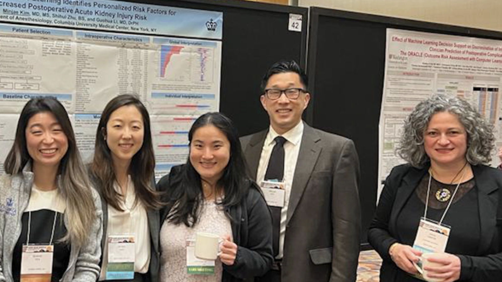 Group of men and women at scientific meeting