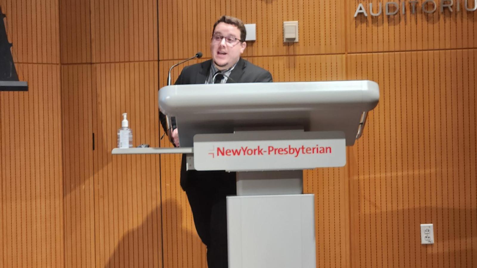 Man speaking at podium