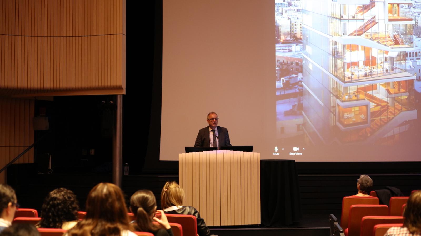 Man speaking at podium
