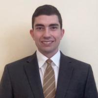 Man in suit and tie, neutral background